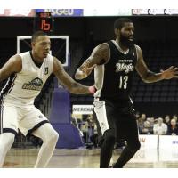 Billy White of the Halifax Hurricanes (left) and Terry Thomas of the Moncton Magic