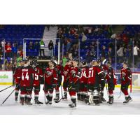 Vancouver Giants exchange congratulations following their season-opening win