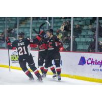 Prince George Cougars celebrate a goal against the Victoria Royals